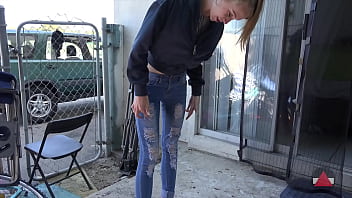 Skinny Girl In Tight Jeans Sucks Ice Pop free video